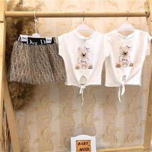 دو تیکه بلوز گره ای تدی دیور و دامن استردار دخترانه کد 2897