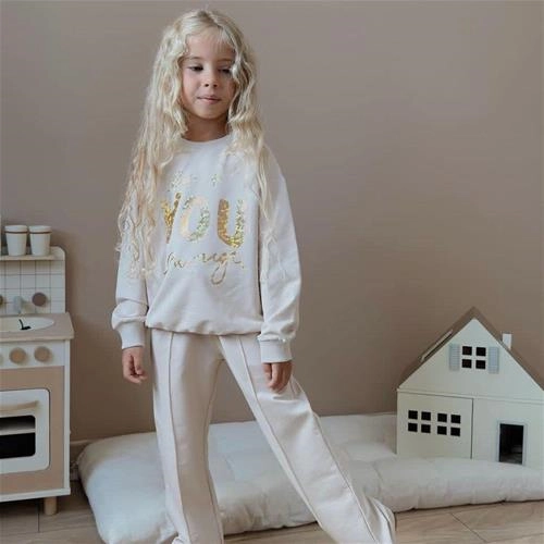 ست دوتیکه دورس سه نخ پولی youو شلوار ترک کد18355